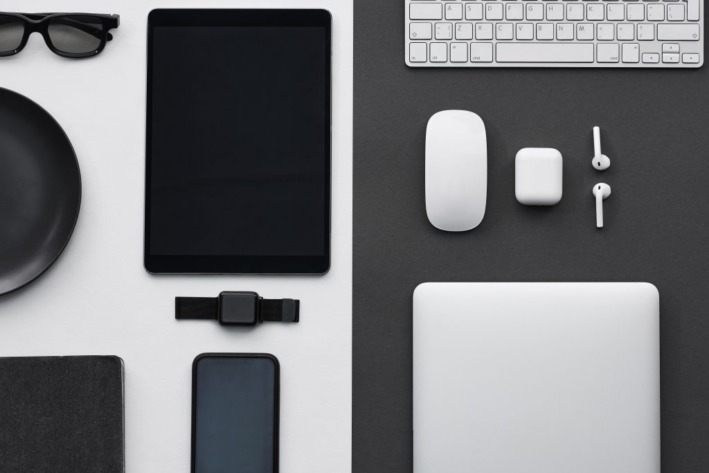 office desk with computer, mouse and keyboard aligned neatly